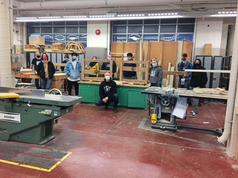 Students building beds for families in need Our Communities