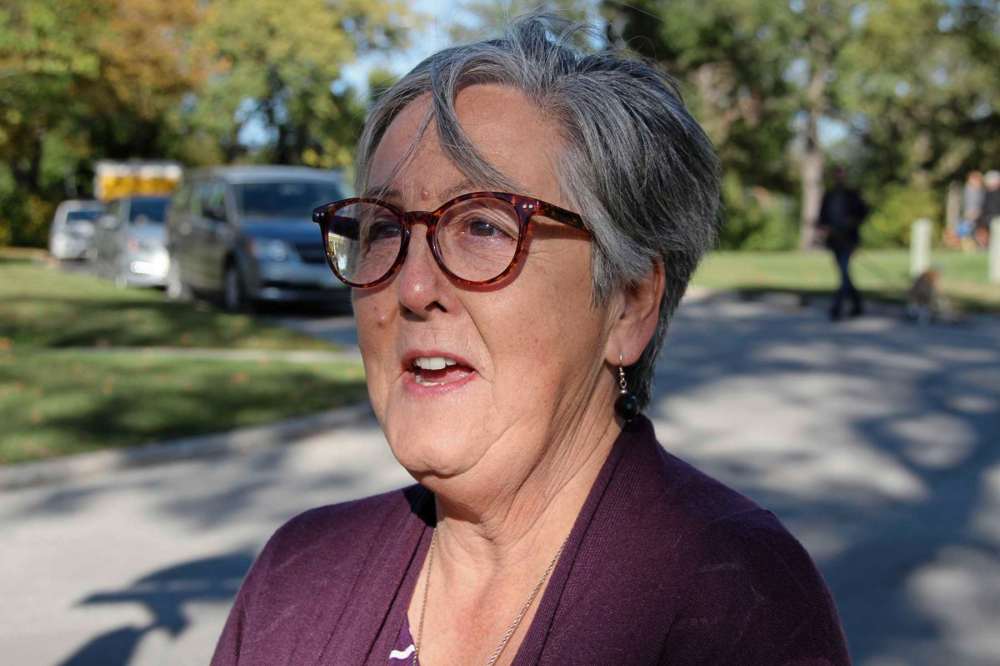 Sou'wester
Mary Barton after the ceremony which unveiled an honourary street sign in her name.