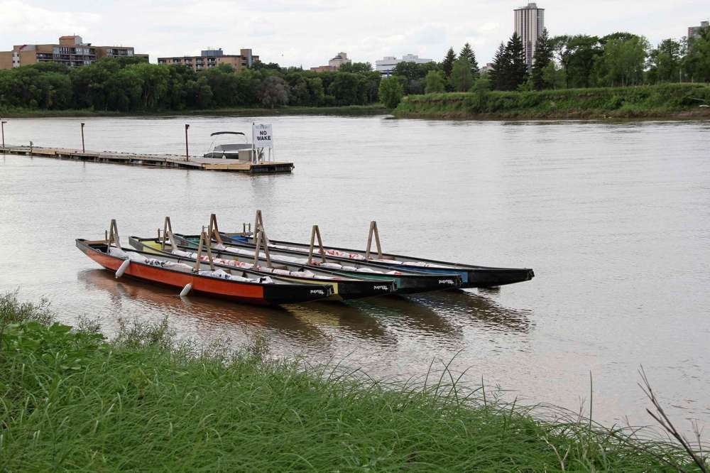 Sou'wester
Dragon boats anchored offshore at the Manitoba Canoe and Kayak Centre have been rigged for a plastic sheet to run the length of each boat, to keep the paddlers safely distant during the pandemic.