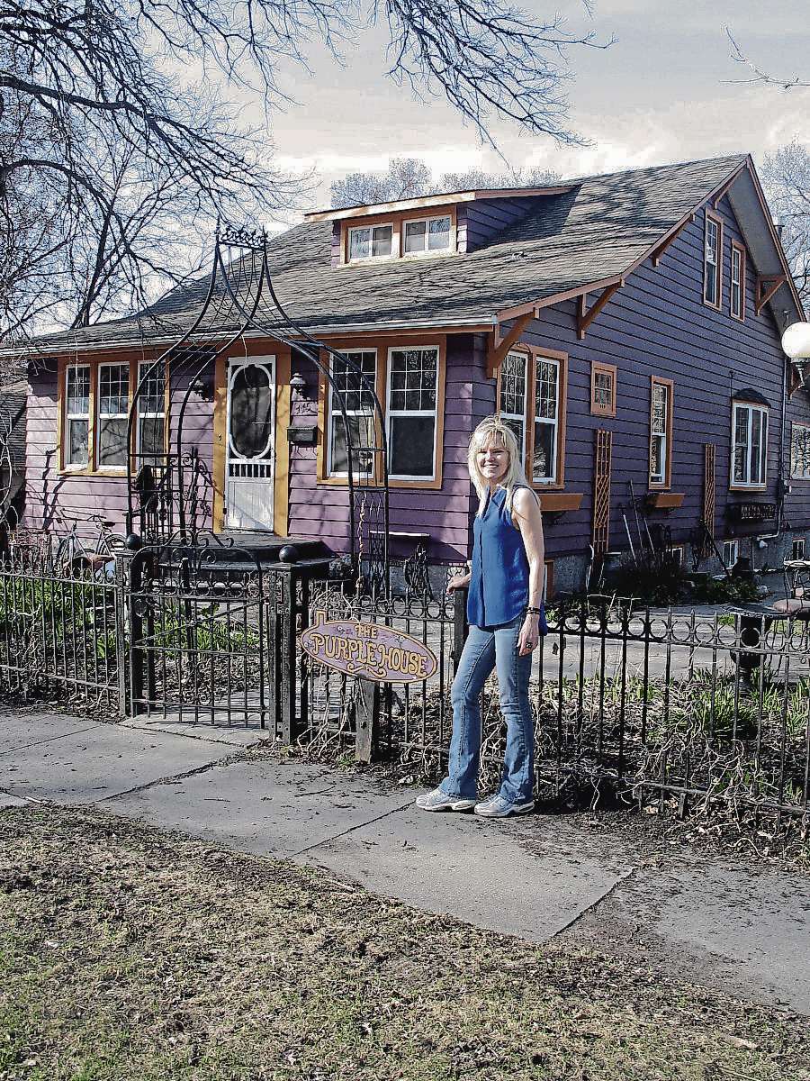 Tony Zerucha
Local author Shirley Kowalchuk stands in front of Linden Avenue’s famed ‘Purple House’ which is a focal point of the Jane’s Walk she hosts on May 8.