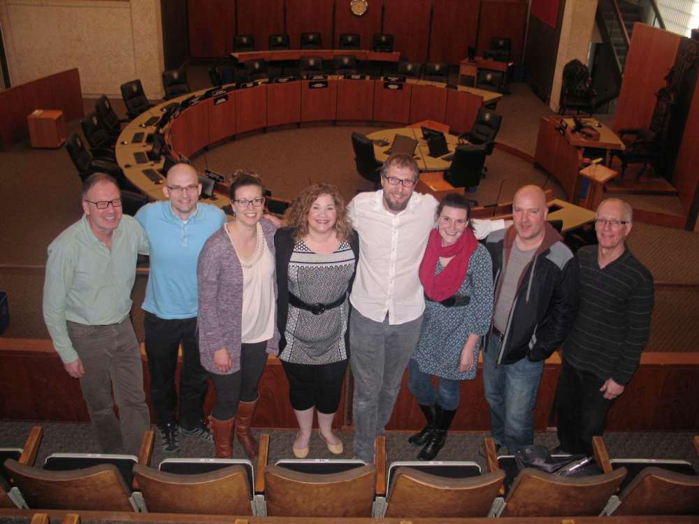 Tony Zerucha
Members of the Elmwood community celebrate the City’s decision to turn down a pawn shop application on April 28.