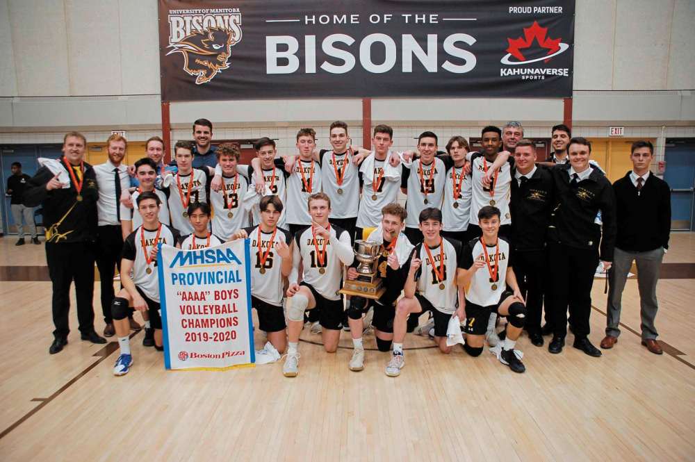 John Kendle
The Dakota Lancers varsity boys volleyball team and their coaches pose for a formal team picture with the Manitoba High Schools Athletic Association's AAAA championship trophy at Investors Group Athletic Centre at the University of Manitoba on Dec. 2, 2019. Dakota beat the Westwood Warriors 3-1 (25-23, 25-23, 22-25, 25-15) to win the title.
