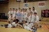 John Kendle
Members of the Oak Park Raiders varsity boys basketball team show off their championship trophy and winners' banner after beating the St. Paul's Crusaders 78-73 in the AAAA provincial final on March 20 at the U of M.