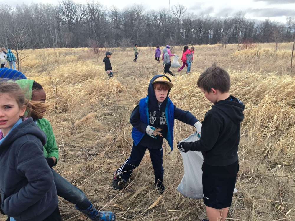 Supplied photo
Students at École St. Norbert Immersion took the initiative on April 27 and headed out into the community armed with garbage bags and gloves to help clean up trash revealed by the winter melt.