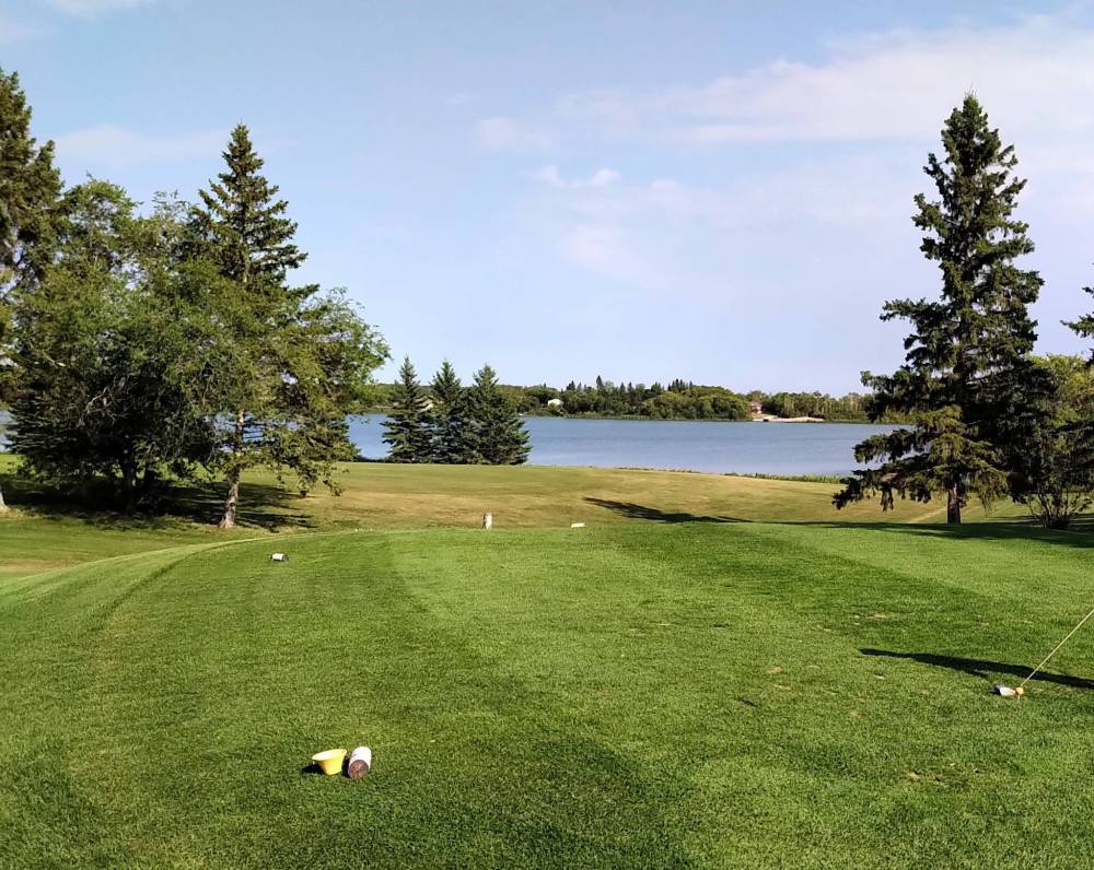 The eighth hole at Lakeside Golf Club and Campground is a par 4 that plays along the beautiful shoreline of Shoal Lake.