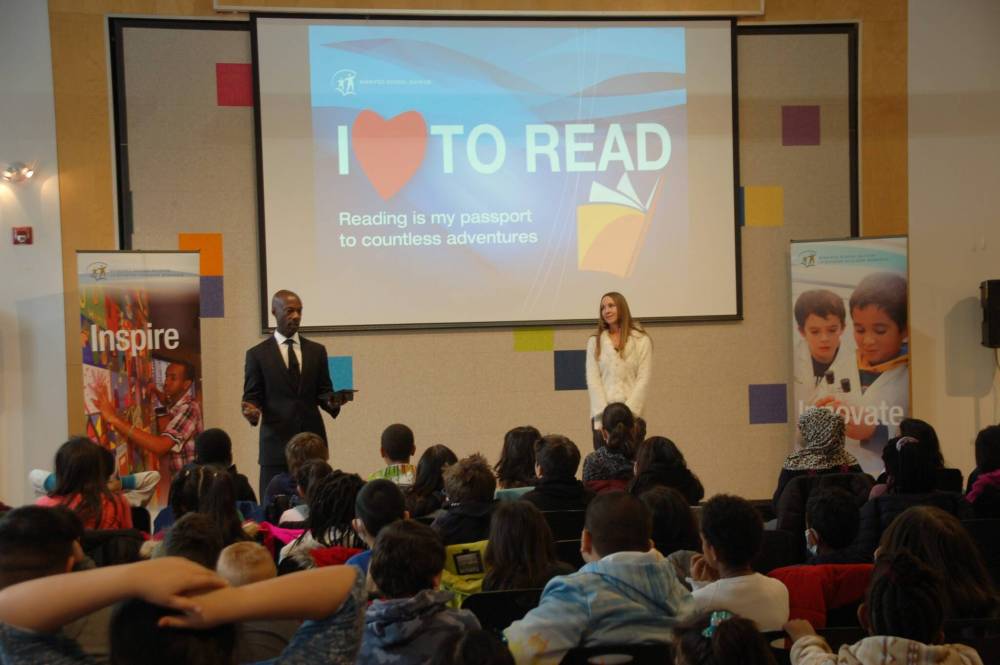 Photo by John Kendle
Devon and Pearlene Clunis read from their book, The Little Boy from Jamaica, which tells the story of how Devon Clunis grew up to become chief of police.