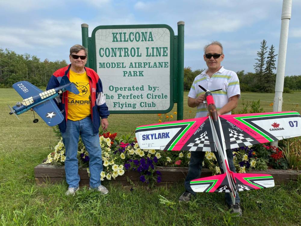 Photo by Sheldon Birnie
Perfect Circle Flying Club president Larry Maltman (left) and longtime member Kevin King are control line model plain enthusiasts who meet regularly at the club’s field at Kilcona Park to fly planes. The club has made a number of improvements to its parcel of land at Kilcona Park, which is located just off Springfield Road.