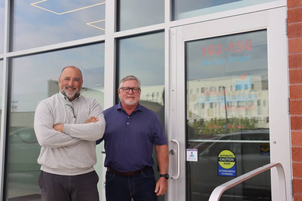 Photo by Emma Honeybun
Chief financial officer and chief executive officer of Réseau Compassion Network, Bob Lafreniere and Daniel Lussier respectively, outside of their new location at 156 Marion St. The organization is in charge of a new affordable living facility in St. Boniface, Les suites Marion (same location), which aims to “put a roof over the heads” of low-income families in the area.