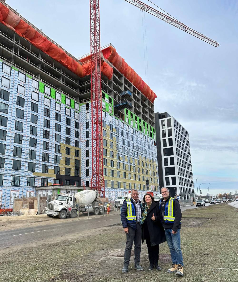Supplied photo
(From left) Neil Hylton, Janice Lukes and Henry Morton are pictured at the top-off party for the new Align apartment block at the corner of Pembina Highway and Bison Drive.