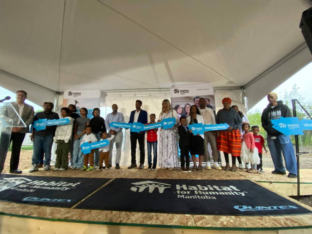 Photos by Sheldon Birnie
On Sept. 18, Habitat for Humanity Manitoba welcomed the first 15 families to Habitat’s new Pandora Avenue West development. When complete, it will be home to 55 new families, or an estimated 275 people.