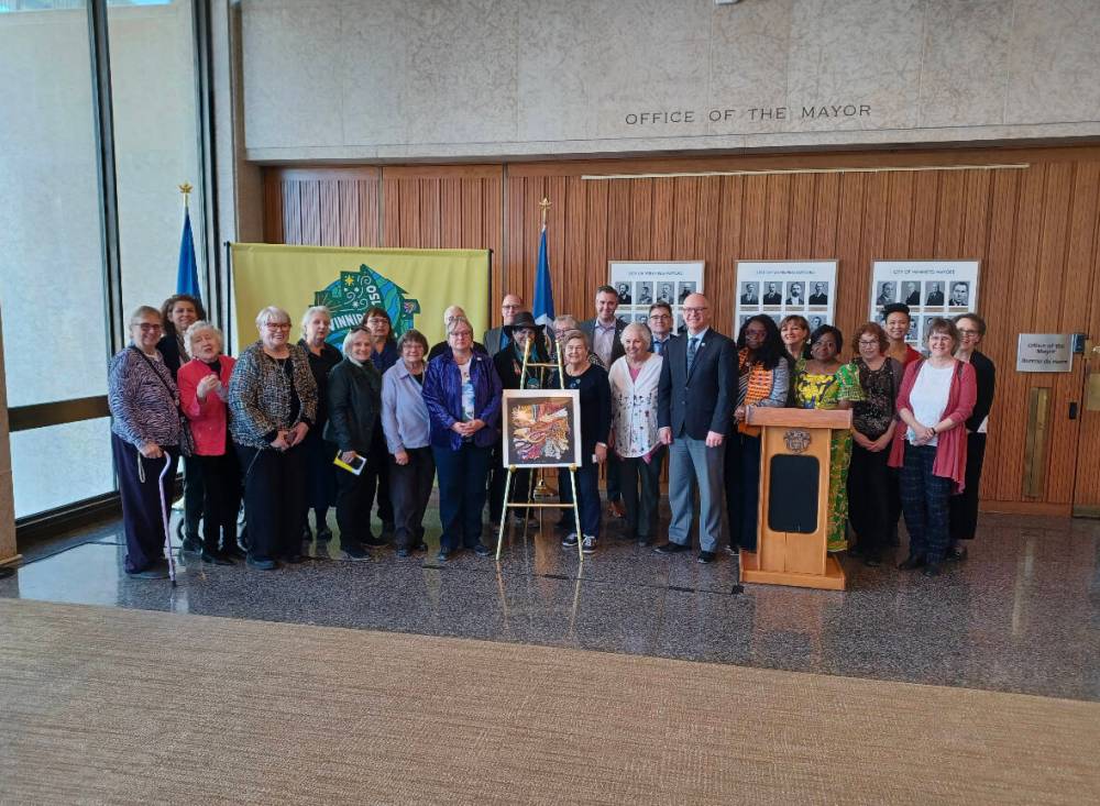 Supplied photo
Members of the Council of Women of Winnipeg are pictured at city hall recently. This year, the advocacy group turns 130 years old. The anniversary is accompanied by a book, She Won The Vote For Women in Winnipeg, which was written by Robert E. Hawkins.