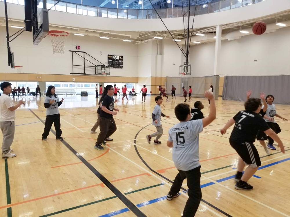 Supplied photo
Students from École Victoria-Albert School and Strathcona School participate in a noon-hour game at the Sport for Life Centre as part of the new Inner City Basketball League.