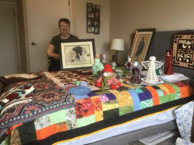 Photo by Anne Yanchyshyn
Olive Norberg displays her varied handicrafts.