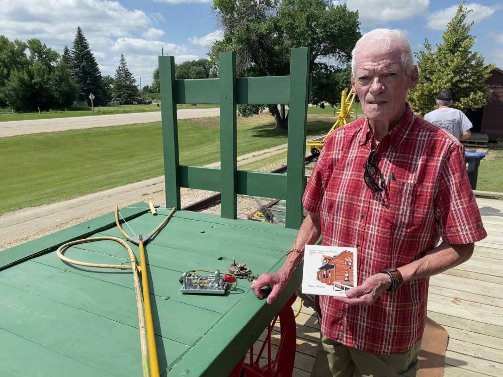 Supplied photo
Roy Kading, a former CN station agent, is seen donating railway memorabilia to the Miami Railway Station Museum. The museum is one of several rail-related places in the province people can visit this summer.