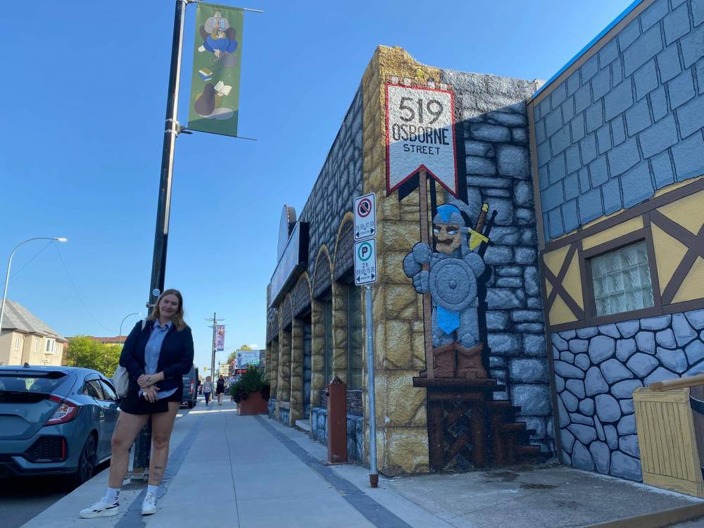 Photo by Sheldon Birnie
Local illustrator Cato Cormier’s art can now be found on 22 new banners along Osborne Street