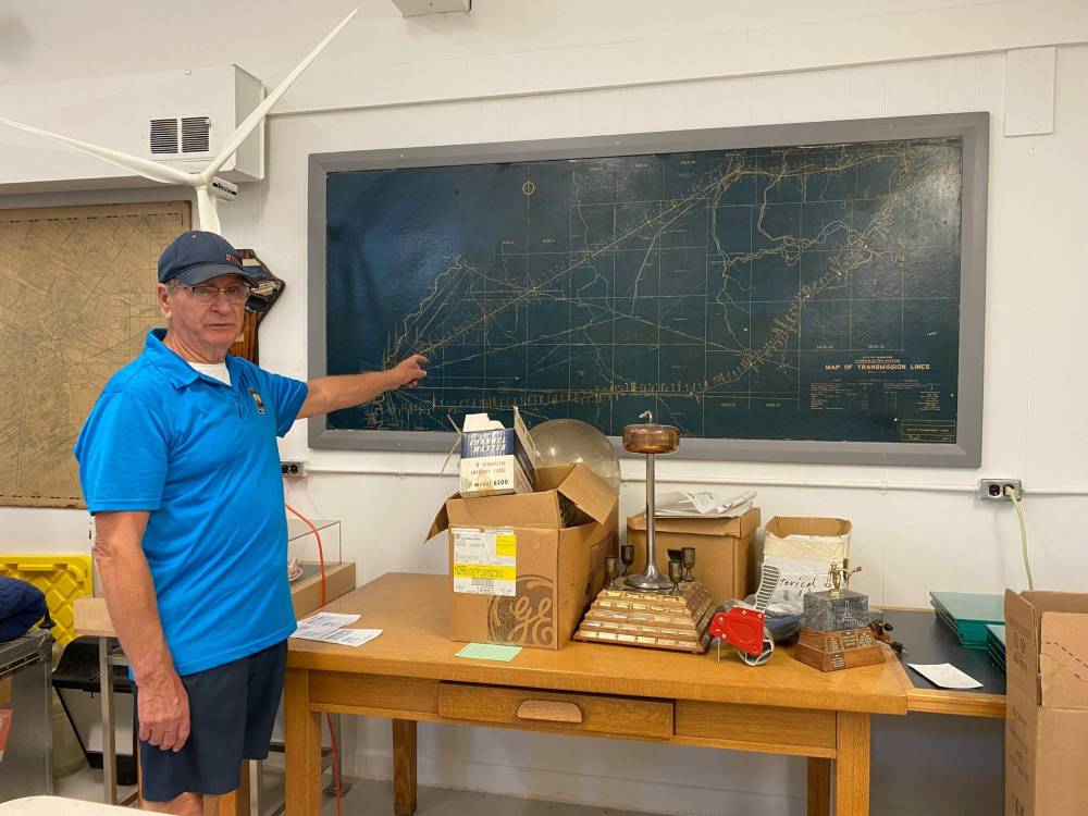 Photo by Sheldon Birnie
Dave White, a retired hydro lineman and longtime volunteer with the Manitoba Electrical Museum (680 Harrow St.) shows off a map from 1932 detailing the hydro transmission line from Pointe du Bois dam to the Rover Avenue station.