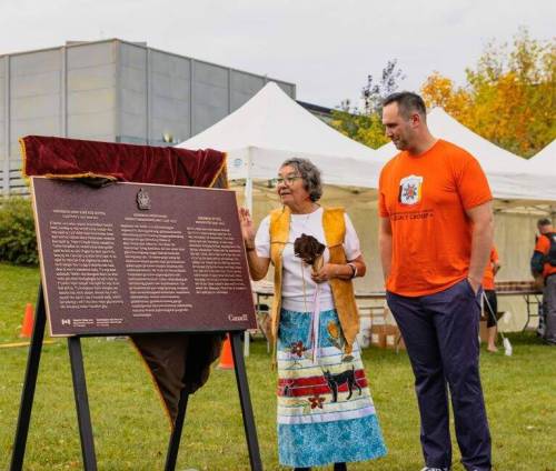 Supplied photo
                                Elder Mabel Horton and Winnipeg South Centre MP Ben Carr unveil the Historic Sites and Monuments Board of Canada plaques commemorating the former Assiniboia Residential School on Sept. 30.
