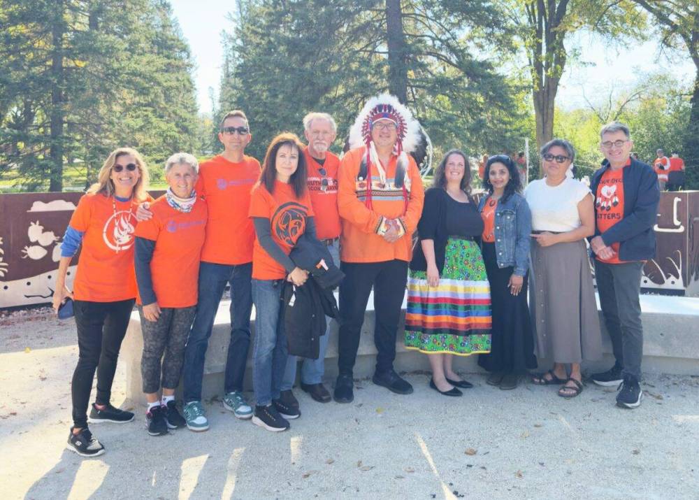 Supplied photo
Tuxedo MLA Carla Compton (fourth from right) was pleased to take part in Winnipeg’s first Reconciliation Walk on Sunday, Sept. 28 at Assiniboine Park, which was organized by Ankita Soni (third from right), owner of the Medicine Shoppe in Tuxedo.