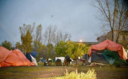 Photo by Doug Kretchmer
                                The homeless camp behind Thunderbird House at the southeast corner of Higgins Avenue and Main Street.