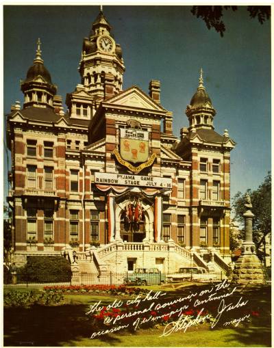 Free Press file photo
                                Winnipeg’s old ‘gingerbread’ city hall, featuring clockworks first installed in 1903, is depicted in this colour photo signed by former mayor Stephen Juba. The clockworks were included in the Edmonton Court clock at Portage Place and their future is unclear now the mall is being redeveloped.