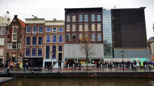 Photo by RoseAnna Schick
                                Anne Frank House (with the black facade at ground level) and the attached museum in Amsterdam will leave an indelible mark on anyone who visits.