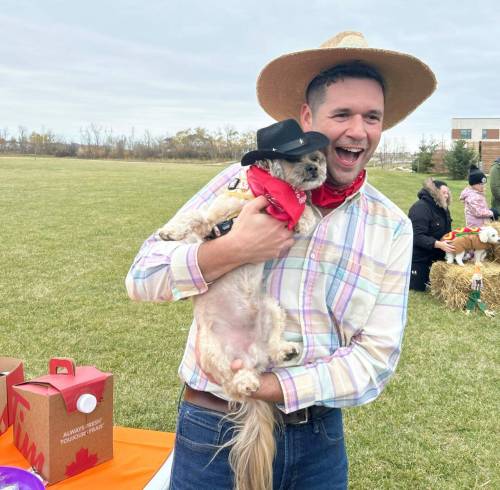 Supplied photo
                                Lagimodière MLA Tyler Blashko met constituents — of all breeds — at a recent Pet Parade.