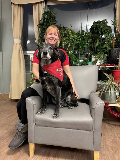 Photo by Tracy Groenewegen
                                Squeaker. the soon-to-be-retired therapy dog, is pictured with owner Suz Shiells.
