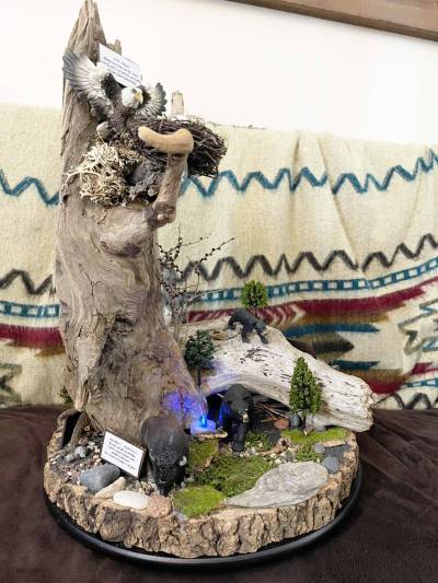 Photo supplied by Carol Smith
                                7 Teachings, a piece of driftwood art by Carol Smith