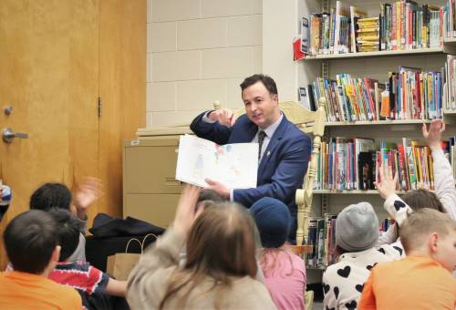 Supplied photo
                                St. James MLA Adrien Sala reads to students as part of I Love to Read Month 2025.