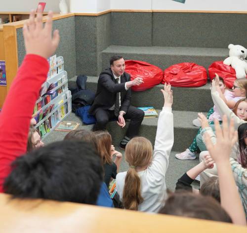 Supplied photo
                                St. James MLA and provincial finance minister Adrien Sala visits a class during I Love to Read Month.