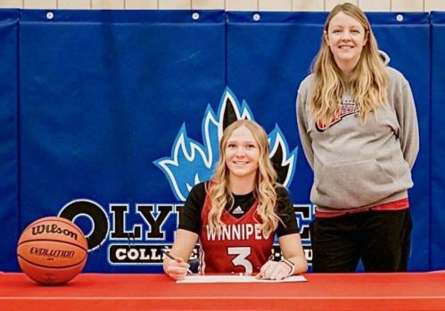 Supplied photo
                                In February, Collège Jeanne-Sauvé guard Emma Elliott signed her letter of intent to play at the University of Winnipeg under coach Alyssa Cox.