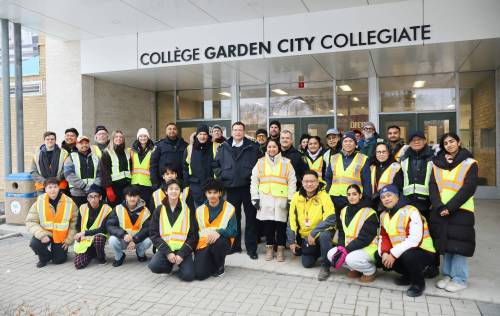 Supplied photo
                                Area residents, Old Kildonan councillor Devi Sharma, police chief Gene Bowers and members of the Northwest Bear Clan gather before heading out to patrol the Garden City neighbourhood.