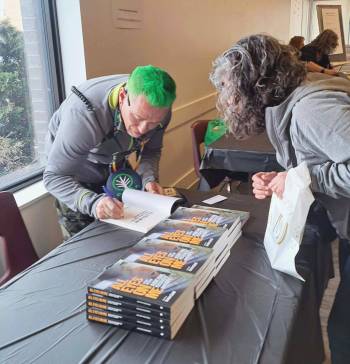 Supplied photo
                                Darren Lillie also spoke at the launch of More Than You Give, and later signed copies of his book, All Eyes on Me.