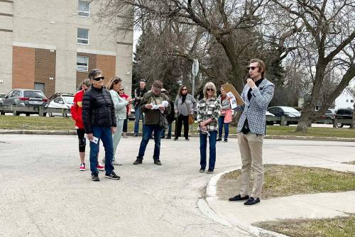 Photo by Colin Fraser
                                Kenneth Ingram (at right) is the founder and current president of the Seven Oaks Historical Society. He recently led a Jane&rsquo;s Walk tour of the neighbourhood titled &lsquo;The Matriarchs of Matheson and McAdam&rsquo;.
