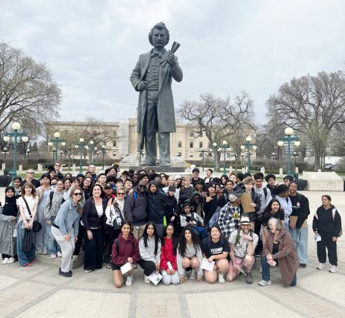 Supplied photo
                                Grade 8 students and staff from École South Pointe School posed with St. Johns MLA Nahanni Fontaine at the Louis Riel statue on the grounds of the Manitoba legislature.
