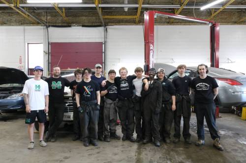 Photo by Rylee Gerrard
                                Several Grade 12 automotive students at Murdoch MacKay Collegiate. Other Grade 12 students not pictured are out of class getting industry experience at several businesses across the city.