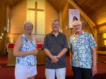 Photo by Sheldon Birnie
                                (From left) Cathy Mondor, Carey Isaac, and Brian Crow inside St. Mary Magdalene Anglican Church (3 St. Vital Rd.). The church, which celebrates its 100th anniversary this year, is set to close at the end of June.