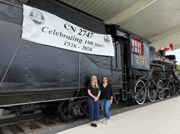 Photo by Rylee Gerrard
                                From left: Jennifer Maxwell, Transcona Museum&rsquo;s assistant curator, and Alanna Horejda, the museum&rsquo;s curator, are pictured at Rotary Heritage Park (735 Kildare Ave. W) recently with the CN2747.