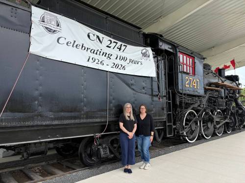 Photo by Rylee Gerrard
                                From left: Jennifer Maxwell, Transcona Museum&rsquo;s assistant curator, and Alanna Horejda, the museum&rsquo;s curator, are pictured at Rotary Heritage Park (735 Kildare Ave. W) recently with the CN2747.