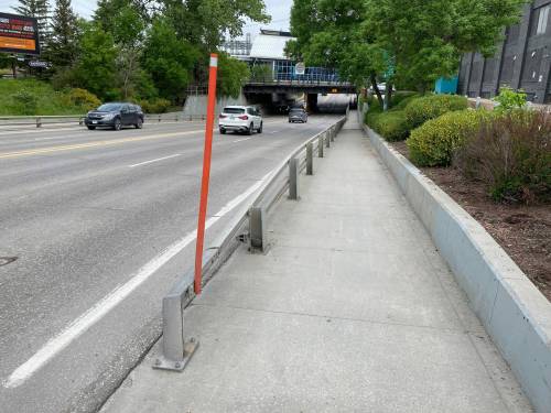 Photo by
                                The sidewalks and roadway that go beneath the Osborne Street underpass are not wide enough to safely accommodate cyclists.