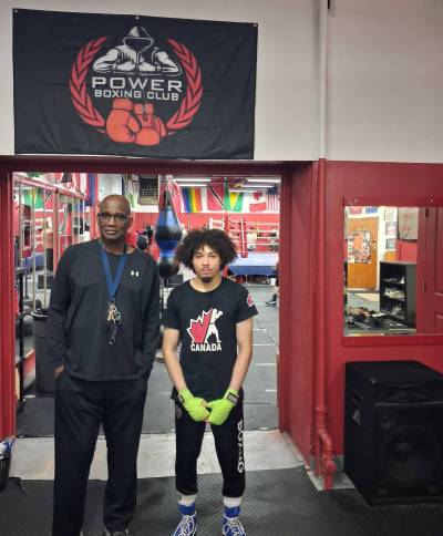 Photo by Tony Zerucha
                                Isaiah Rock (right) and coach Jerome Peters are busy preparing for Rock&rsquo;s next international bout.
