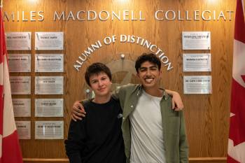 Photo by Maryrose Villena
                                Miles Macdonell Collegiate students Daniel Berezovskyi (left) and Melind Bhroat (right) are two friends who both won the $100,000 Schulich Leaders Scholarship, on June 22.