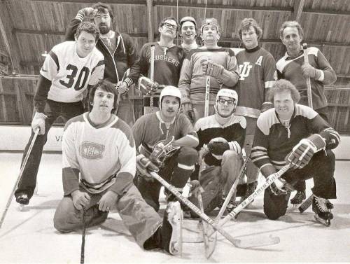 Supplied photo
                                The late Jon Thordarson (front row, left) was the unofficial photographer for the media hockey group that played at River Heights Community Club for many years.