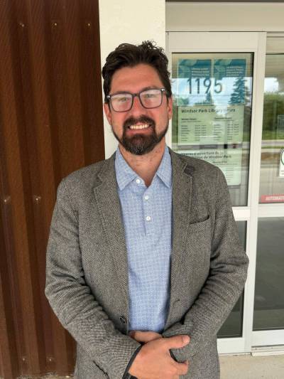 Supplied photo
                                Coun. Matt Allard (St. Boniface) is pictured standing before the Windsor Park Library.