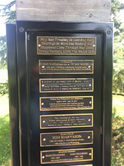 Photo by Fred Morris
                                Dozens of deceased residents of St. James are remembered at the Mayor&rsquo;s Grove at the south side of Assiniboine Park, after their old memorial benches had been replaced.