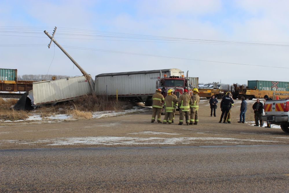 Semi trailer sheared by train The Carillon