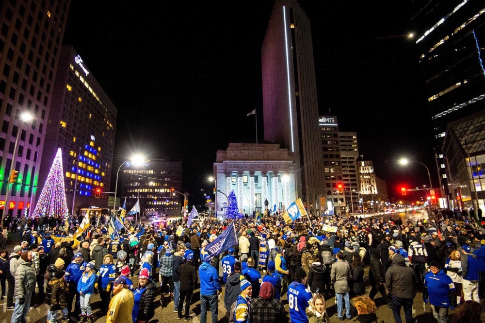 Blue Bombers fans young and old congregate at Portage and Main to celebrate the Bombers winning the Grey Cup in 2021. (Mike Sudoma / Free Press files)