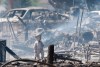 The smouldering remains of houses in Slave Lake, Alta., are seen in a May 16, 2011, file photo. The wildfire that is devastating large swaths of the northern Alberta city of Fort McMurray comes just five years after another blaze destroyed 400 buildings and left 2,000 people homeless in Slave Lake, Alberta. THE CANADIAN PRESS/Ian Jackson
