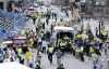 Charles Krupa / The Associated Press
Medical workers aid injured people at the finish line of the 2013 Boston Marathon following an explosion in Boston on Monday.