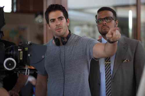 Elie Roth (left) with actor Aaron Burns on the set of Knock Knock, an infidelity-themed film starring Keanu Reeves.